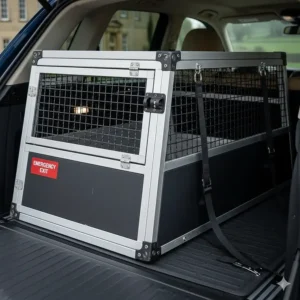 A crash-tested metal dog crate for a BMW X5, featuring emergency escape hatches and secure ISOFIX tethering.
