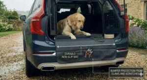 A heavy-duty non-slip bumper protector draped over the rear of a Volvo XC90 to prevent claw scratches when a dog enters the crate.
