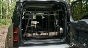 Close-up of a secure, heavy-duty latch on a Newfoundland dog crate for maximum safety.