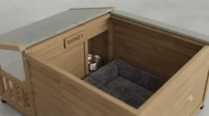 Interior view of the spacious wooden dog box showing ample room for bedding and insulation.