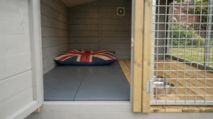 Removable wipe-clean plastic floor panels inside a professional double dog kennel for effortless hygiene maintenance.
