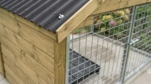 Damp-resistant, pressure-treated timber panels used in affordable breeding kennels under £500.