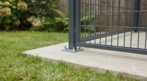 A secure covered dog run installed on a clean concrete slab base for easy cleaning and drainage.