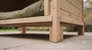 A spacious, low-cost wooden dog kennel providing ample room for a Labrador retriever.